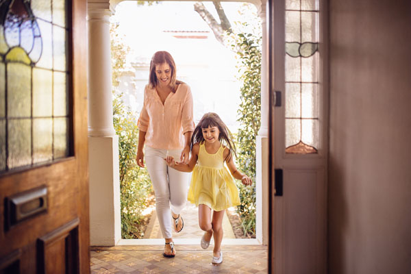 Happy child and mom return home from morning errands.